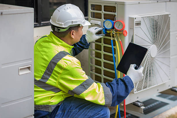Professional Air Duct Cleaning technician working in Old Chatham, NY